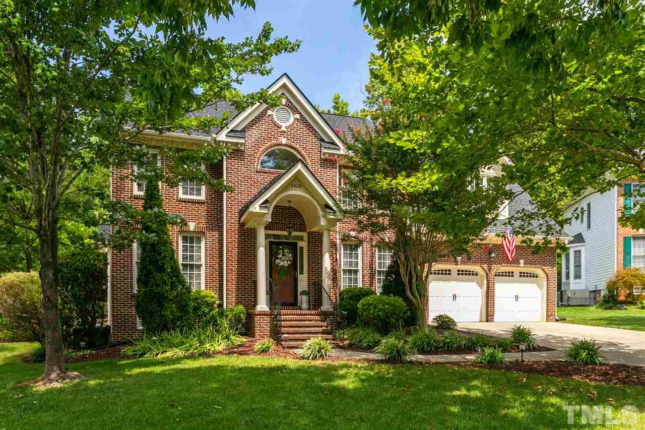 9408 Gabe Court Raleigh, NC 27613 - Photo 3 of 30 a front view of a house with a yard