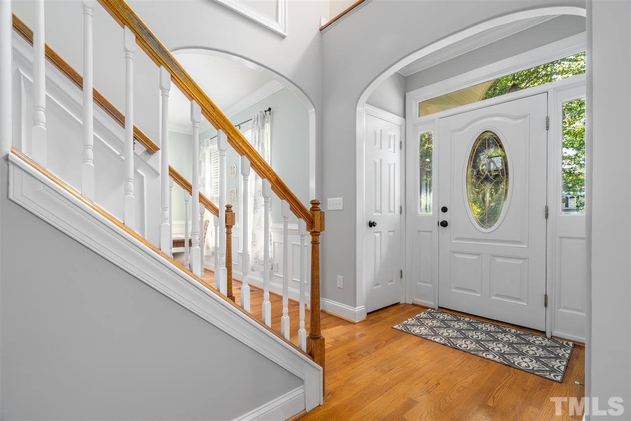 9408 Gabe Court Raleigh, NC 27613 - Photo 4 of 30 a view of an entryway with wooden floor