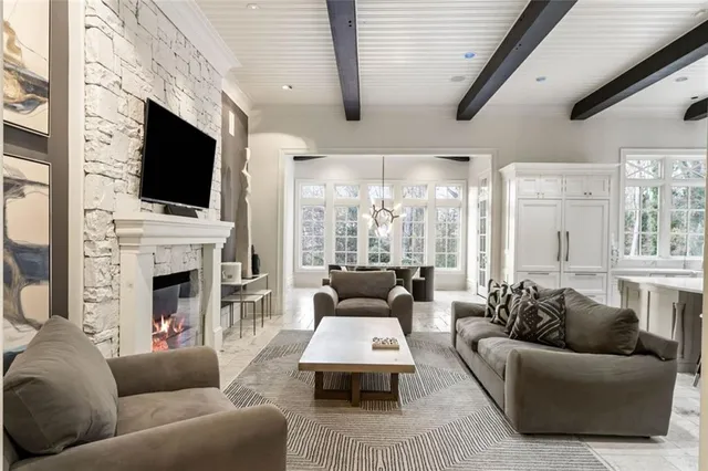 a spacious bathroom with a double vanity sink mirror and bathtub