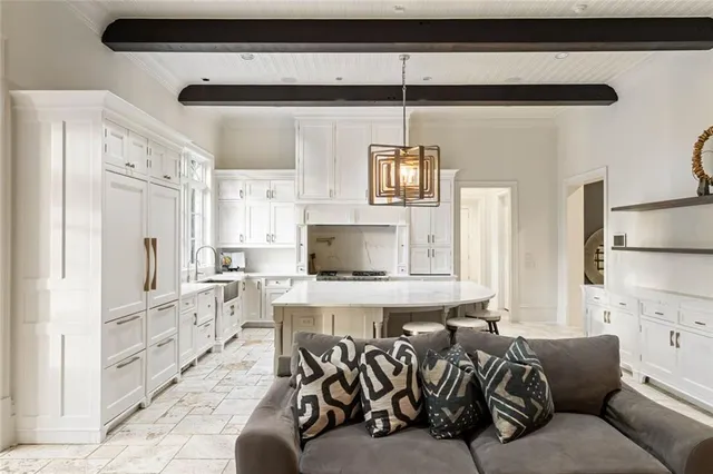 a bathroom with a double vanity sink mirror and shower