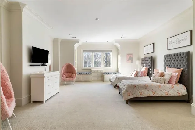 a view of a patio with table and chairs and potted plants