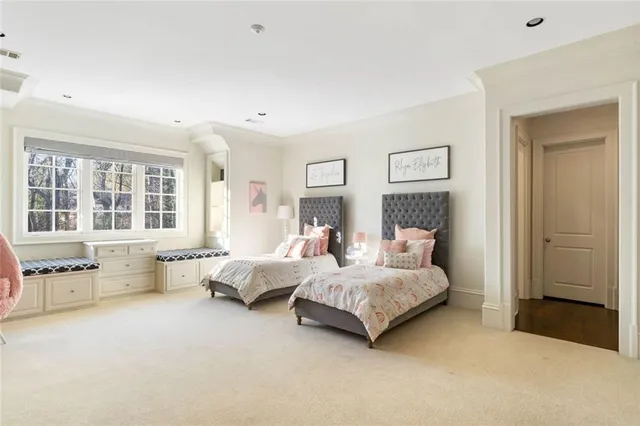 a view of a swimming pool with a sitting space