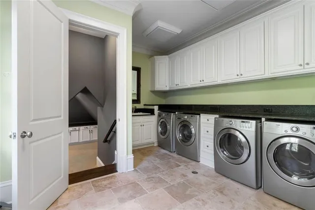 an aerial view of a house with swimming pool garden and patio