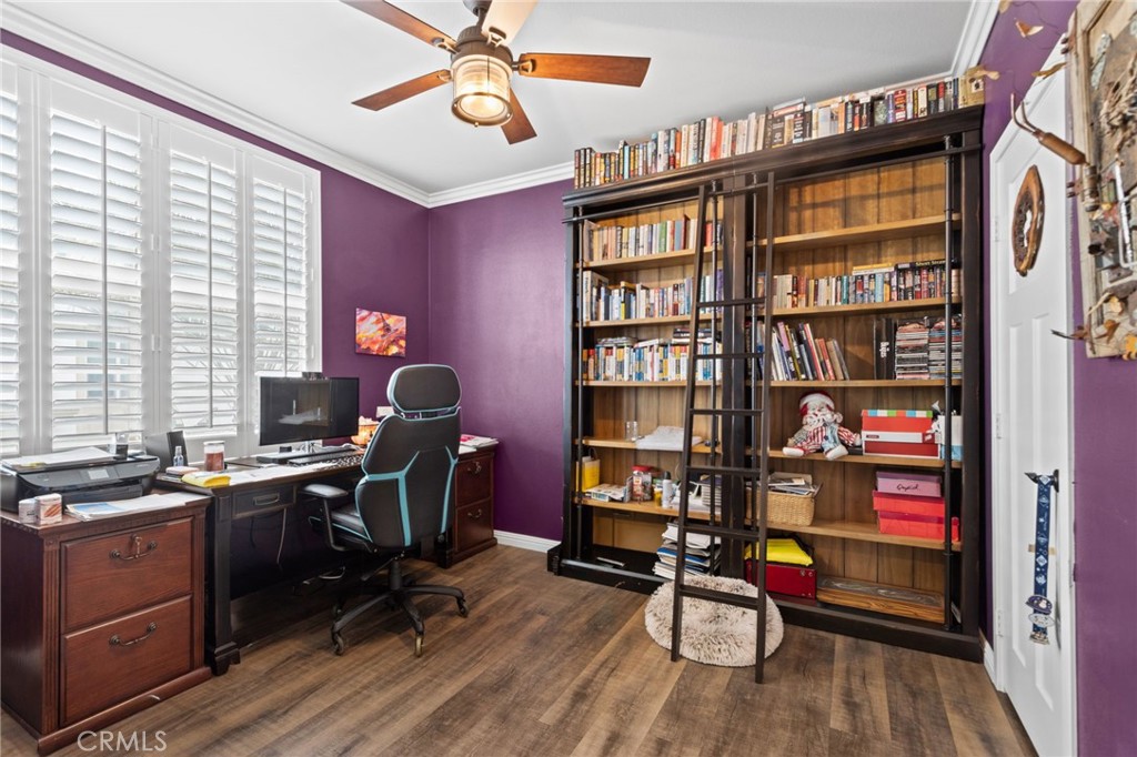 431 South Anaheim Way, Unit 5 Orange, CA 92868 - Photo 20 of 35 a view of a workspace with furniture and a bookshelf
