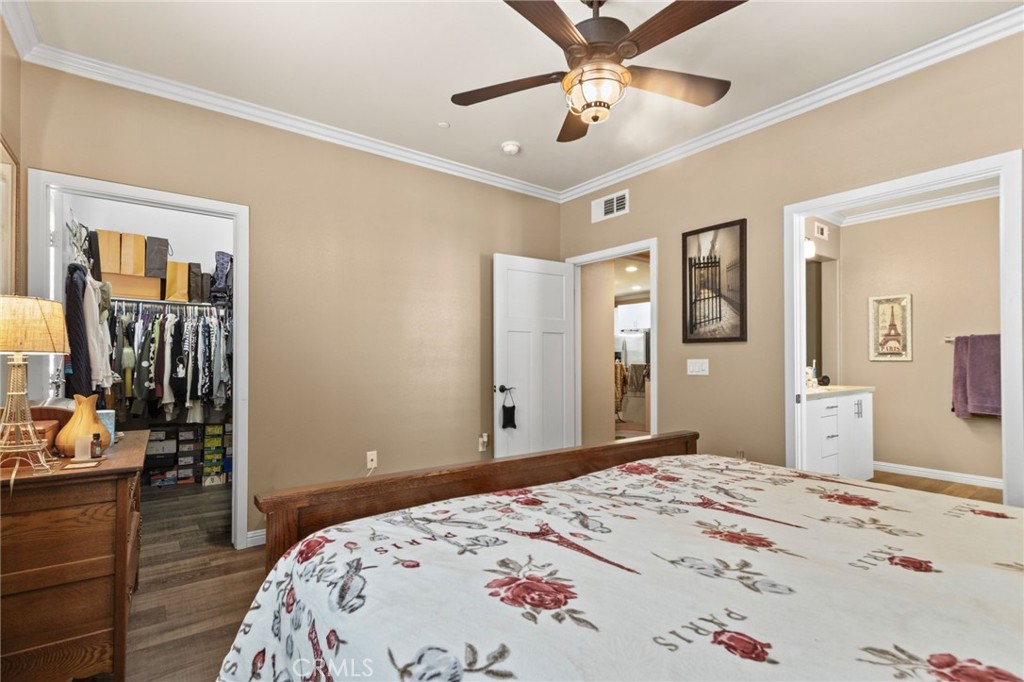 431 South Anaheim Way, Unit 5 Orange, CA 92868 - Photo 23 of 35 a bedroom with a bed and a dresser