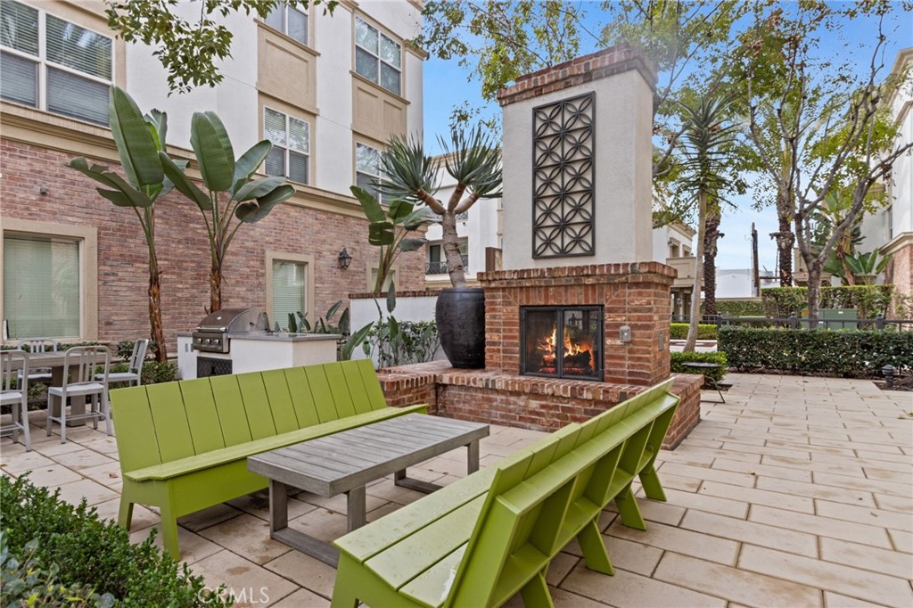 431 South Anaheim Way, Unit 5 Orange, CA 92868 - Photo 31 of 35 a view of an outdoor space with seating area