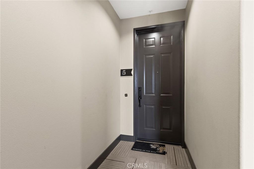 431 South Anaheim Way, Unit 5 Orange, CA 92868 - Photo 7 of 35 a view of an entryway with a table