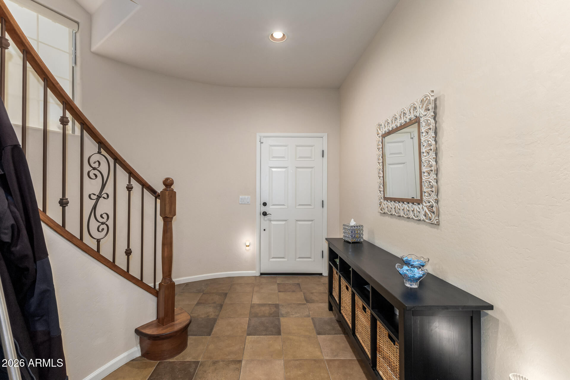 3935 East Rough Rider Road, Unit 1197 Phoenix, AZ 85050 - Photo 9 of 51 a view of a hallway with staircase