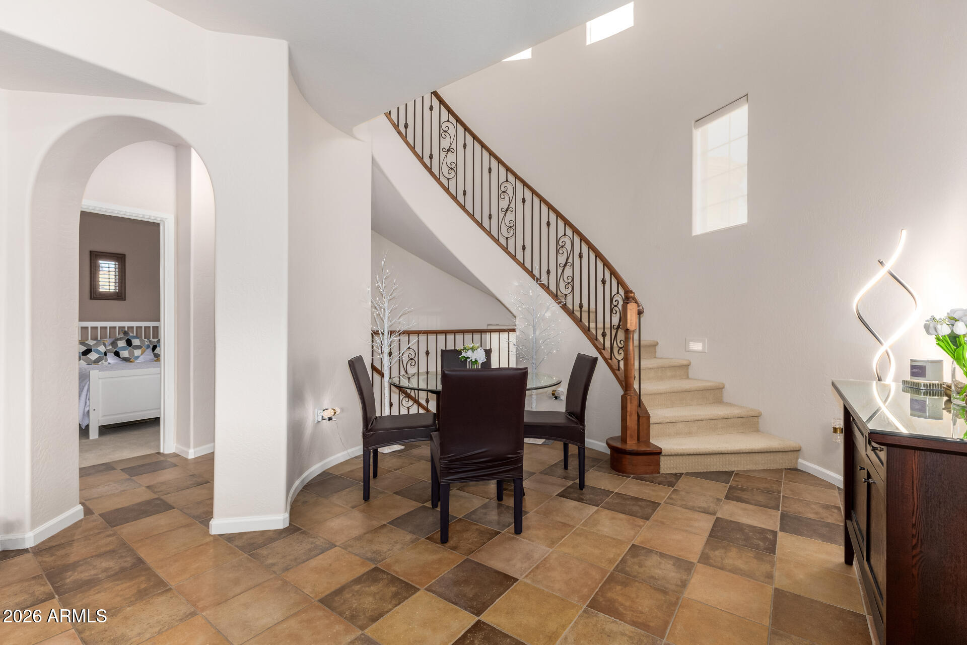 3935 East Rough Rider Road, Unit 1197 Phoenix, AZ 85050 - Photo 10 of 51 a view of entryway and hall with a front door