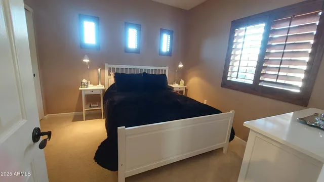 a kitchen with stainless steel appliances a refrigerator and a stove top oven