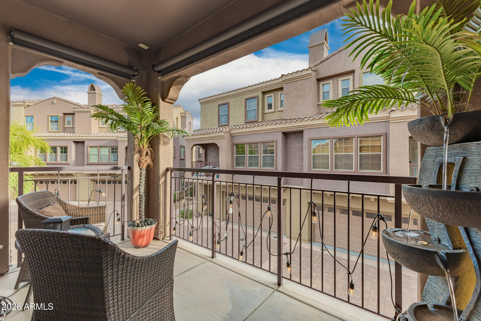 3935 East Rough Rider Road, Unit 1197 Phoenix, AZ 85050 - Photo 35 of 51 a view of a building from a balcony