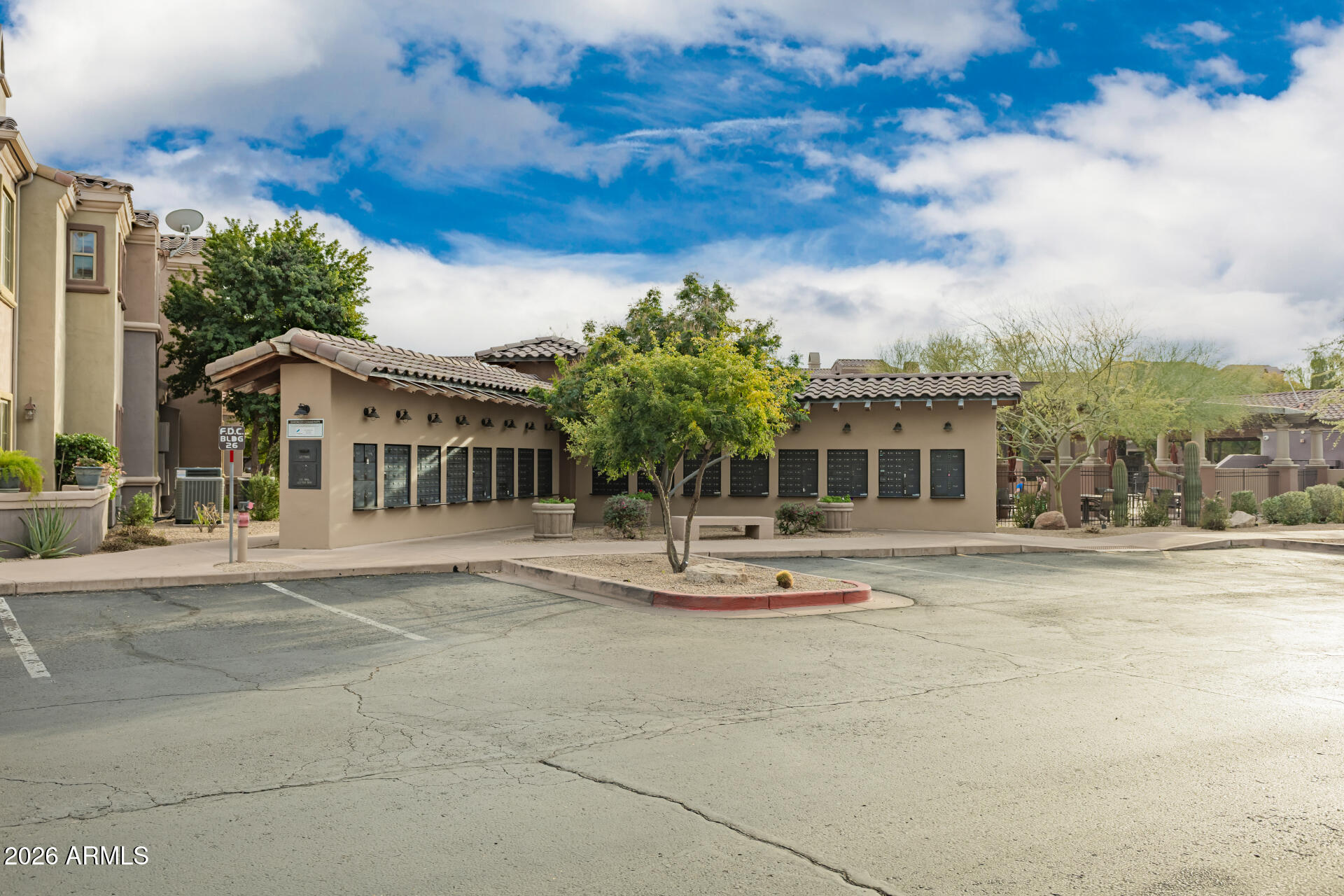 3935 East Rough Rider Road, Unit 1197 Phoenix, AZ 85050 - Photo 47 of 51 a view of a house with outdoor space and sitting area