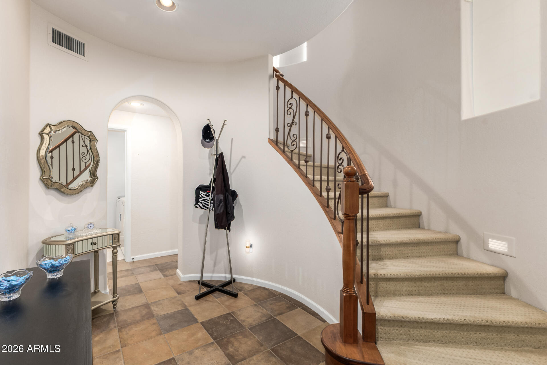 3935 East Rough Rider Road, Unit 1197 Phoenix, AZ 85050 - Photo 6 of 51 a view of entryway with livingroom