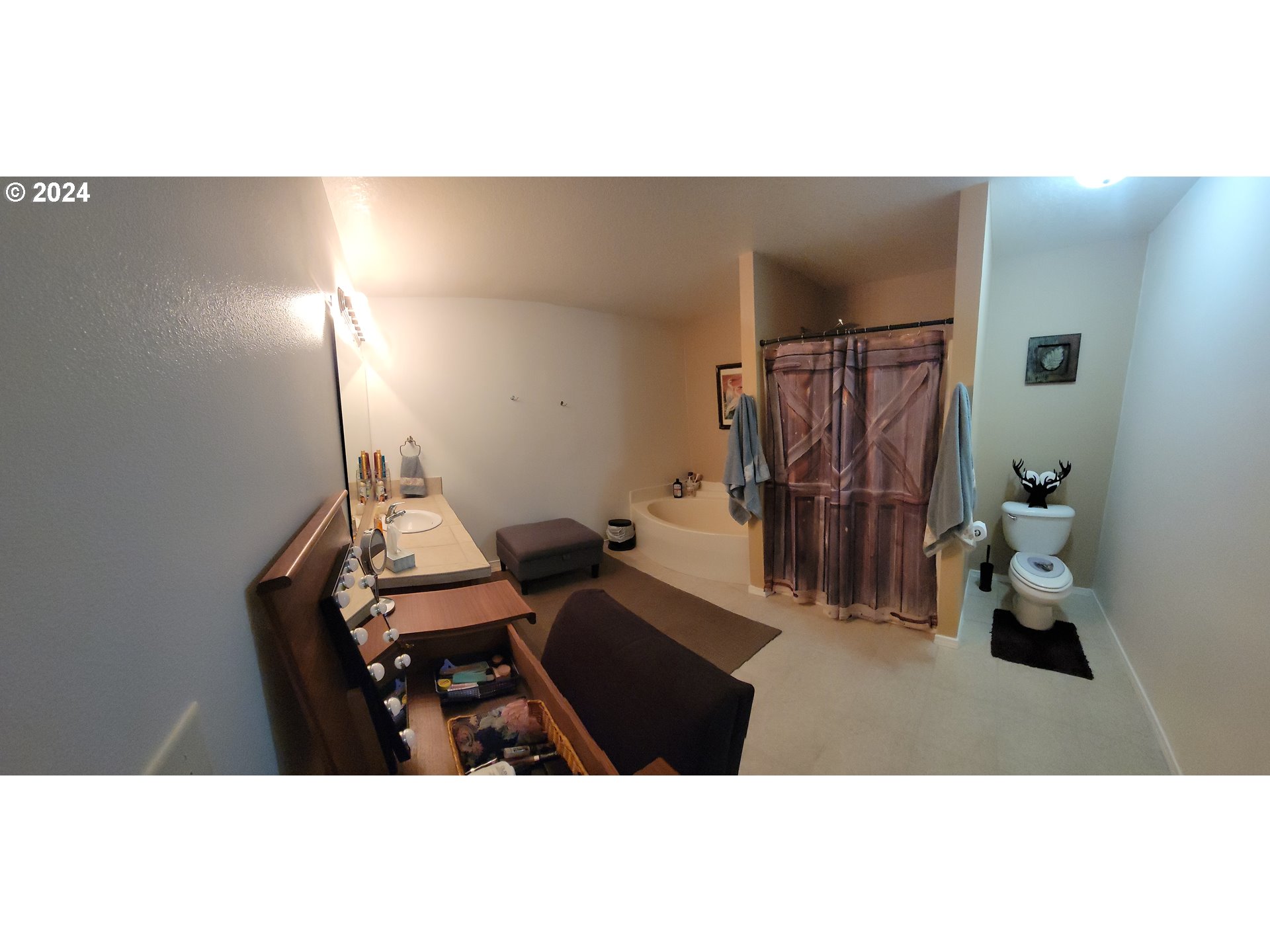 22118 East Yakima Lane Rhododendron, OR 97049 - Photo 13 of 31 a living room with furniture and a flat screen tv
