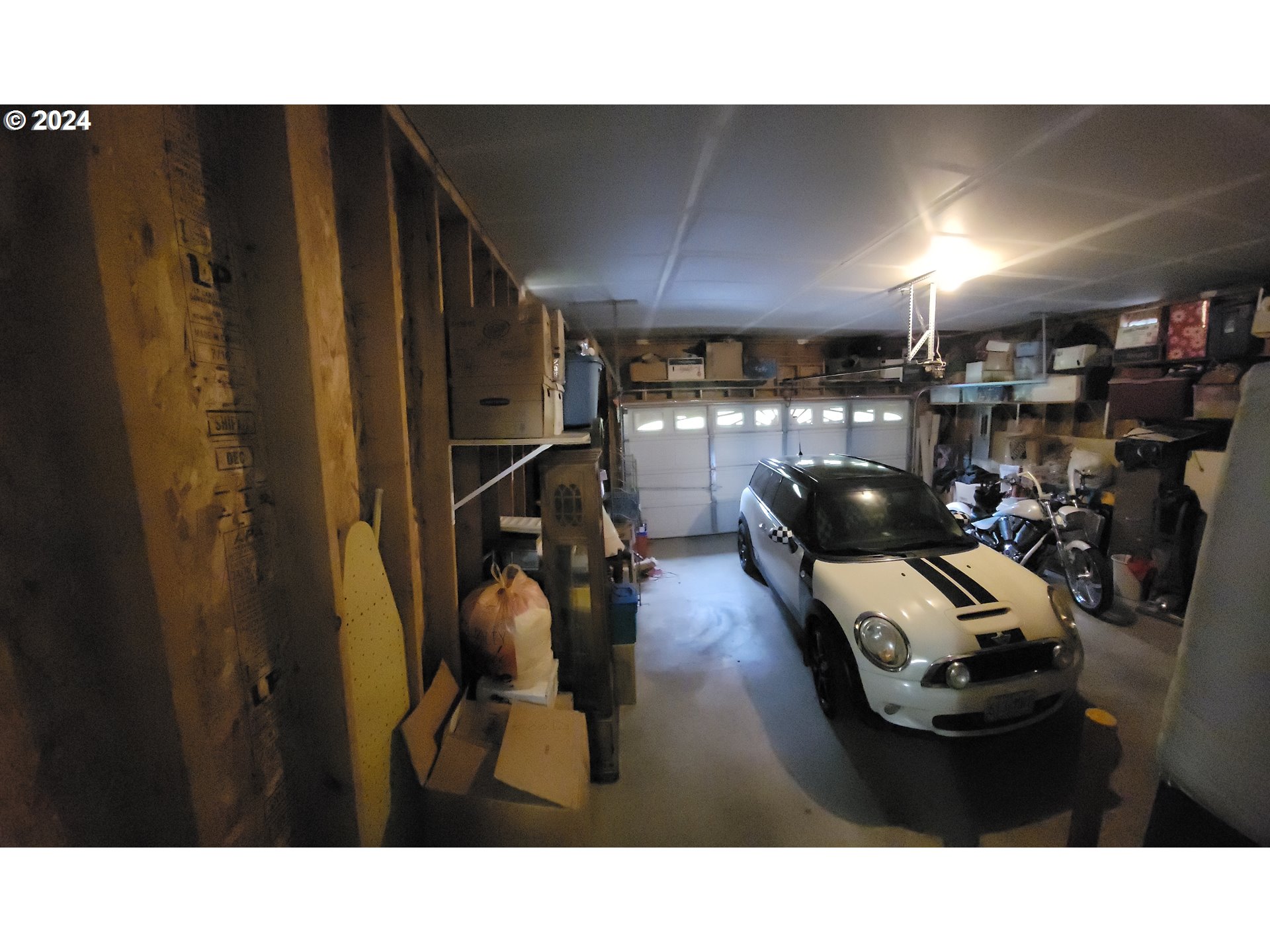 22118 East Yakima Lane Rhododendron, OR 97049 - Photo 15 of 31 a living room with furniture and a flat screen tv