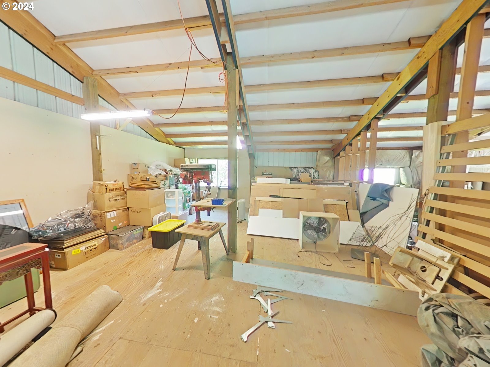 22118 East Yakima Lane Rhododendron, OR 97049 - Photo 22 of 31 a living room with lots of furniture and a large window