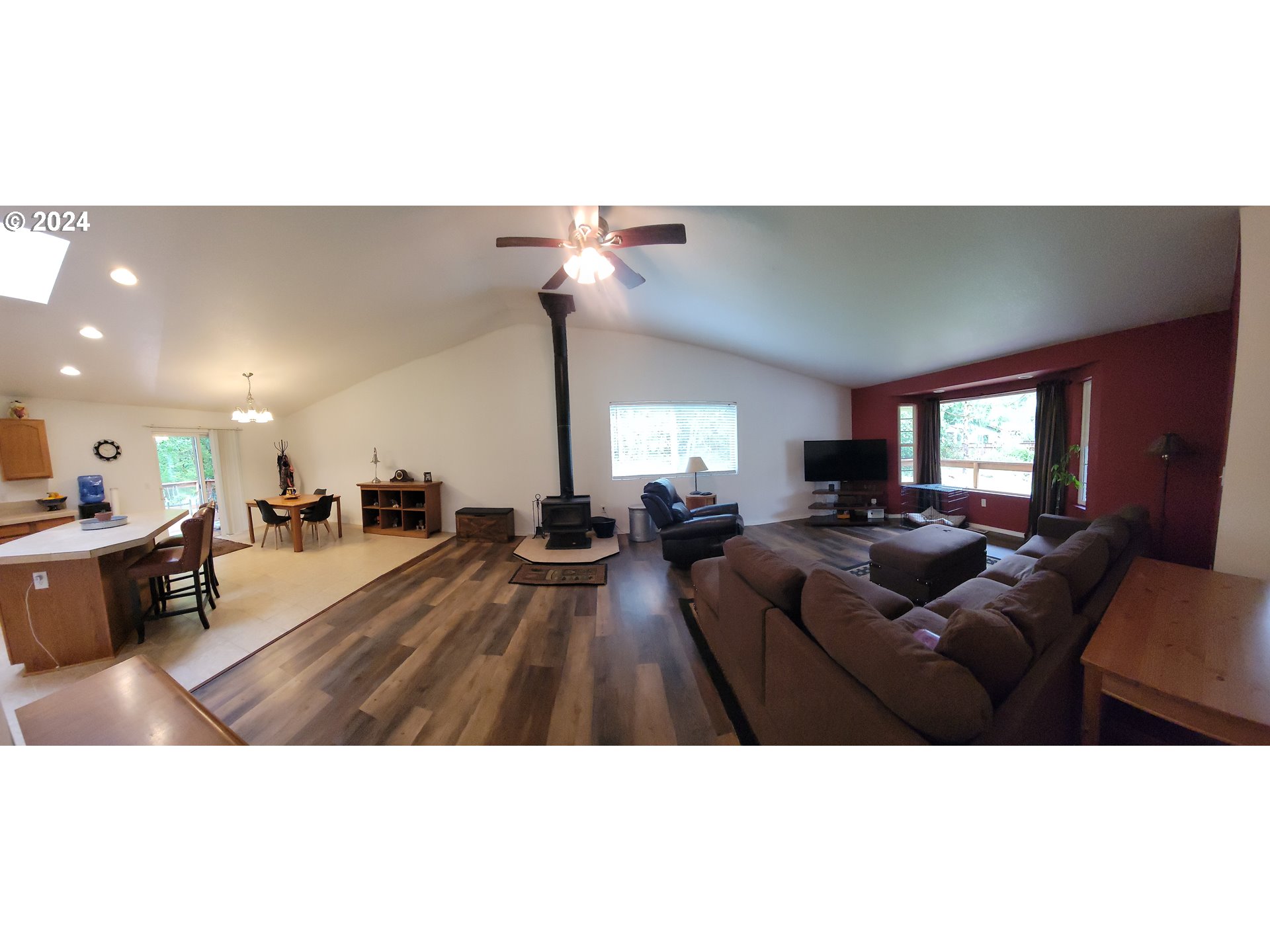 22118 East Yakima Lane Rhododendron, OR 97049 - Photo 3 of 31 a living room with furniture and a chandelier