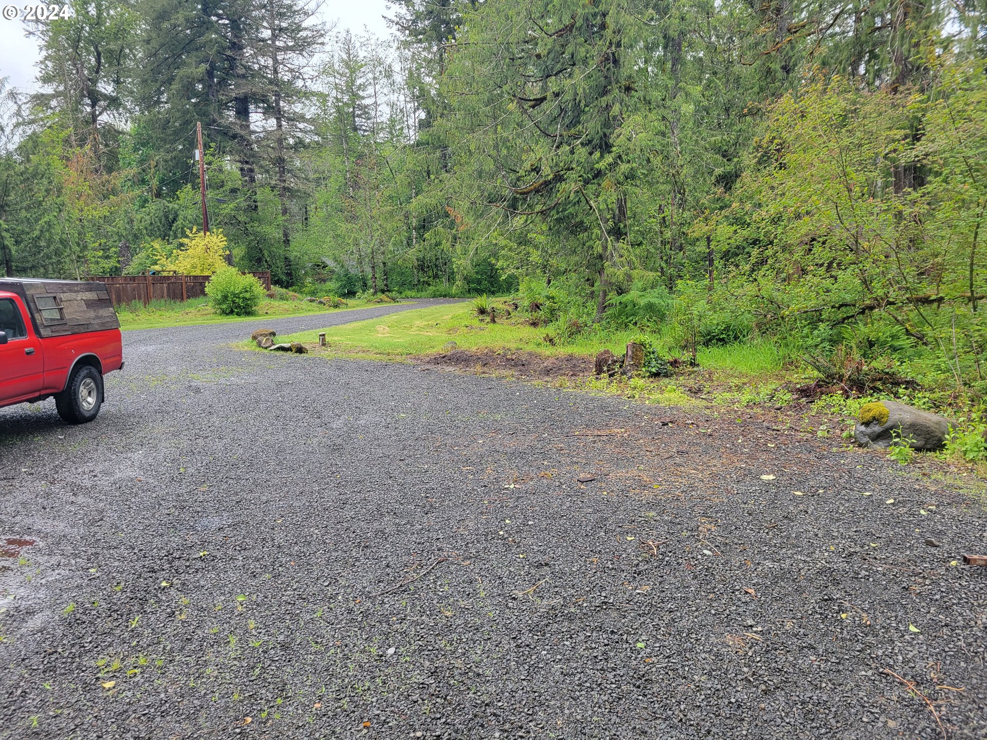 22118 East Yakima Lane Rhododendron, OR 97049 - Photo 31 of 31 a view of outdoor space with trees all around