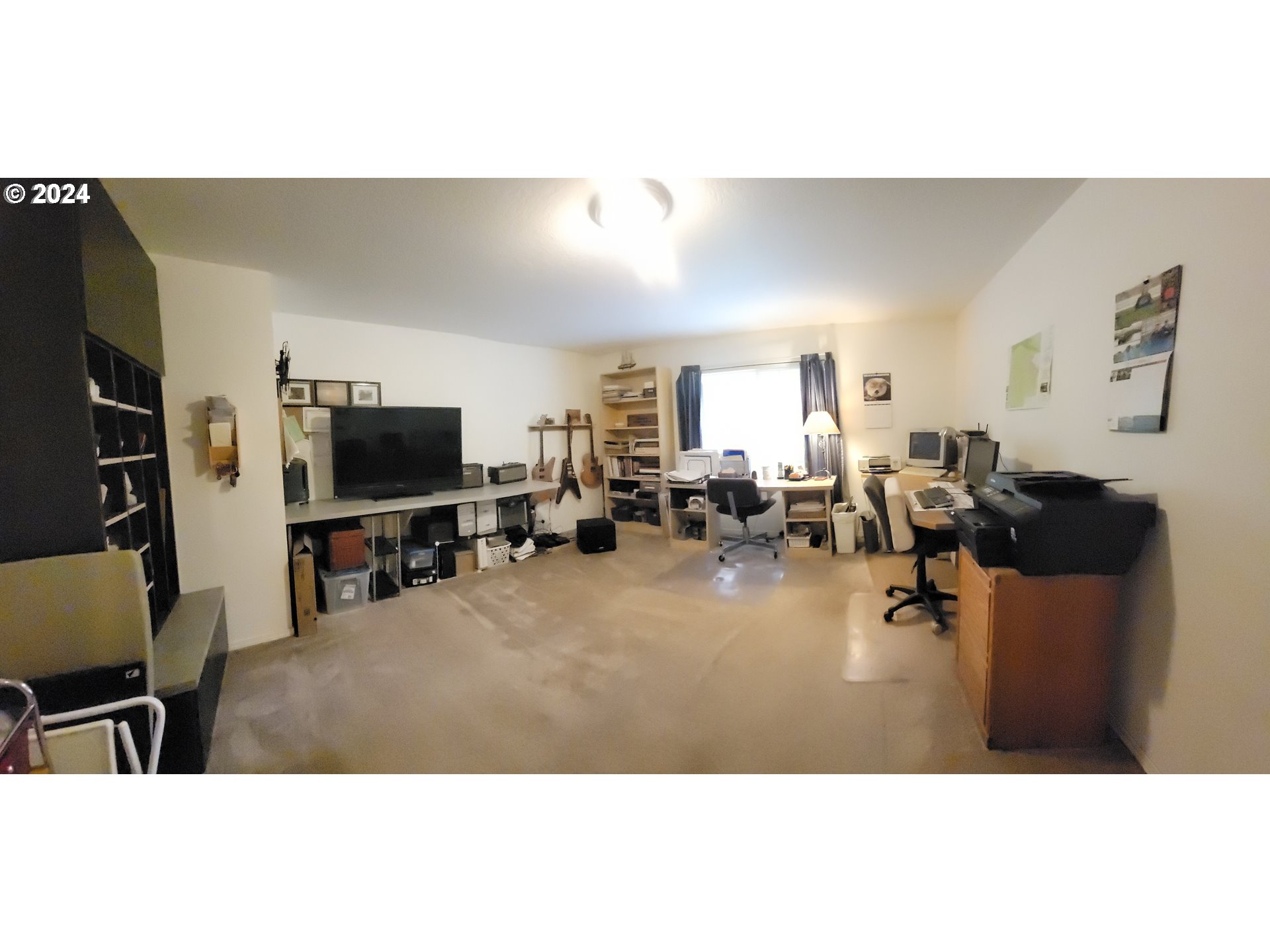 22118 East Yakima Lane Rhododendron, OR 97049 - Photo 7 of 31 a living room with furniture and a flat screen tv