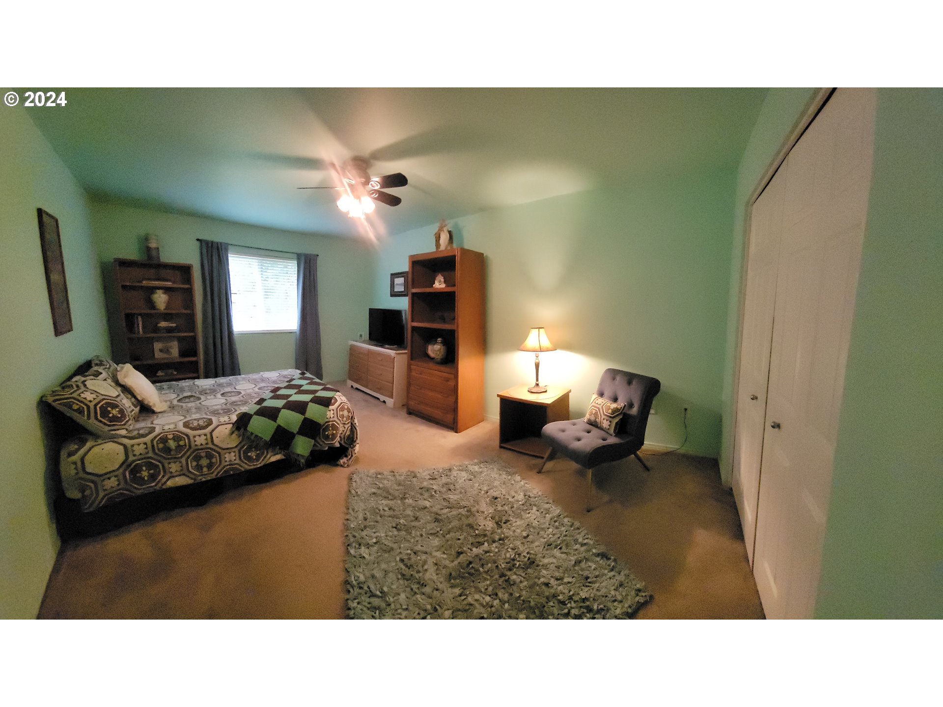 22118 East Yakima Lane Rhododendron, OR 97049 - Photo 8 of 31 a living room with furniture and a fireplace