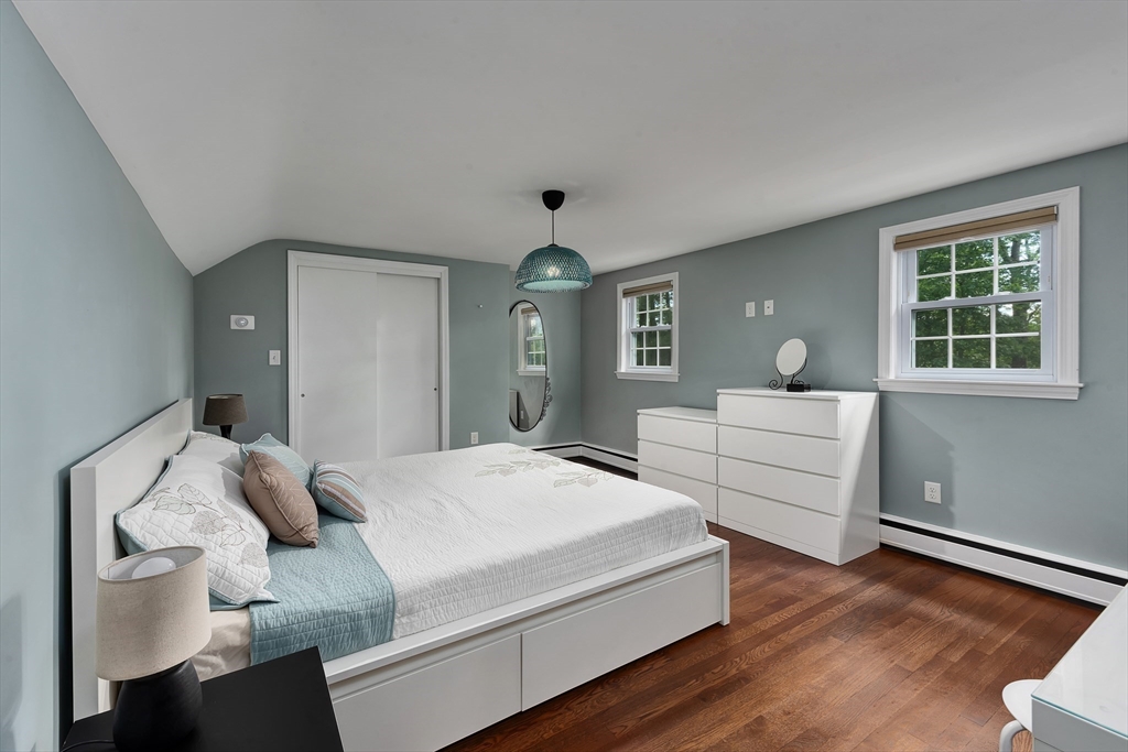 41 Woodcrest Road Boxford, MA 01921 - Photo 11 of 31 a bedroom with a large bed and a window