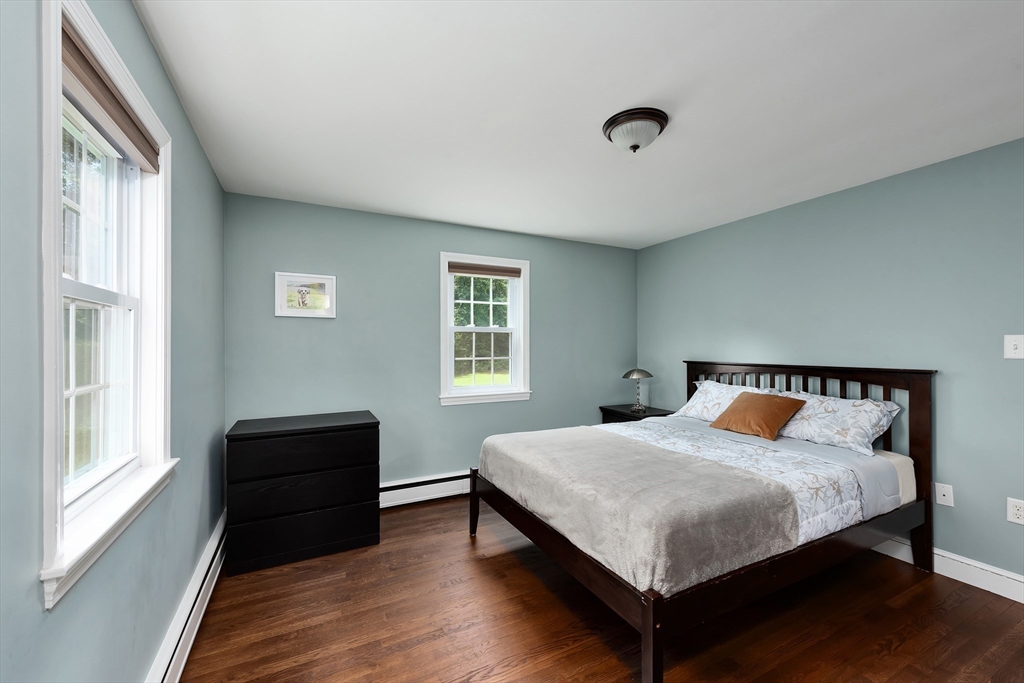 41 Woodcrest Road Boxford, MA 01921 - Photo 13 of 31 a bedroom with a bed and window
