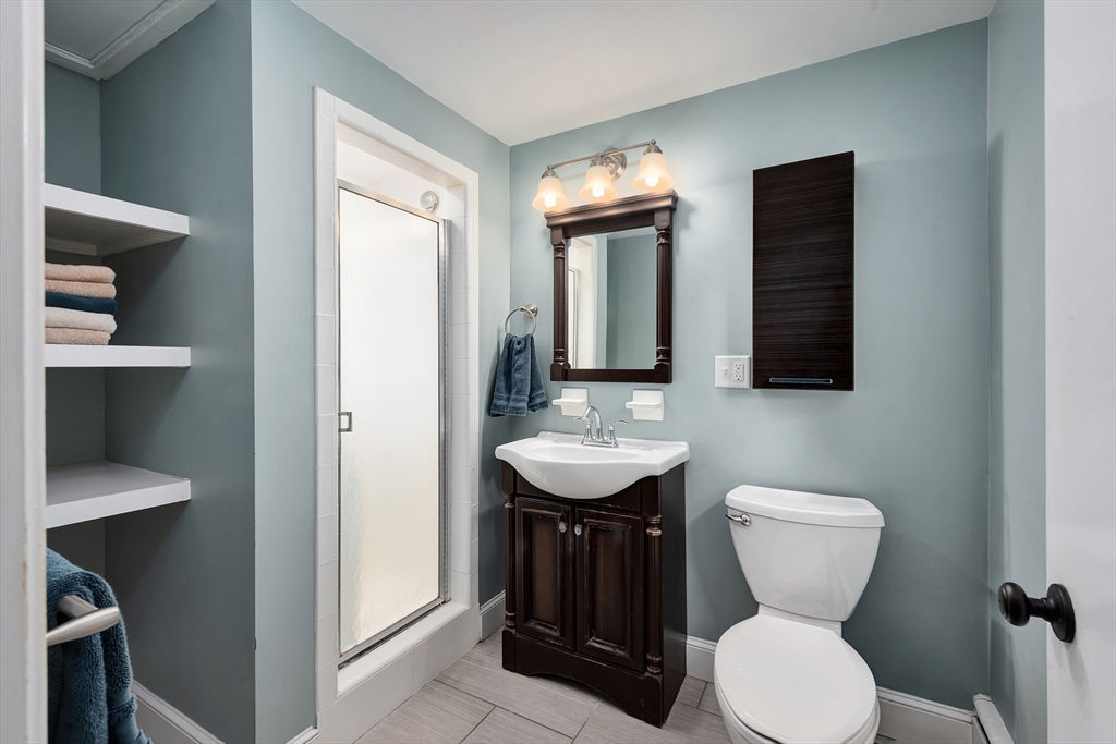 41 Woodcrest Road Boxford, MA 01921 - Photo 14 of 31 a bathroom with a toilet sink and mirror