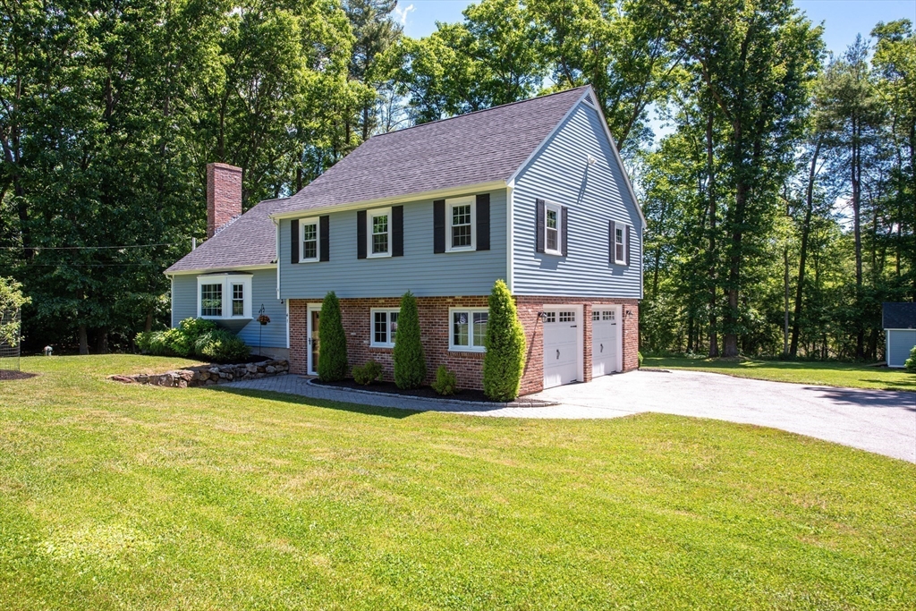 41 Woodcrest Road Boxford, MA 01921 - Photo 2 of 31 a front view of a house with yard and trees