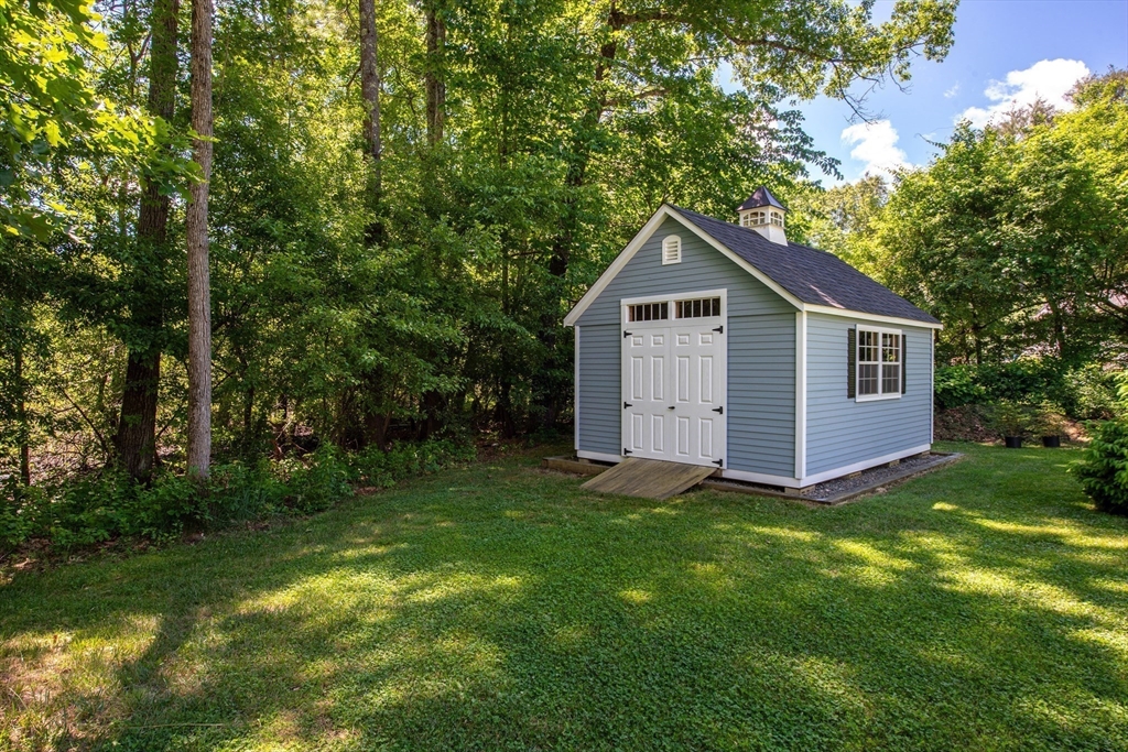 41 Woodcrest Road Boxford, MA 01921 - Photo 22 of 31 a view of a house with a yard