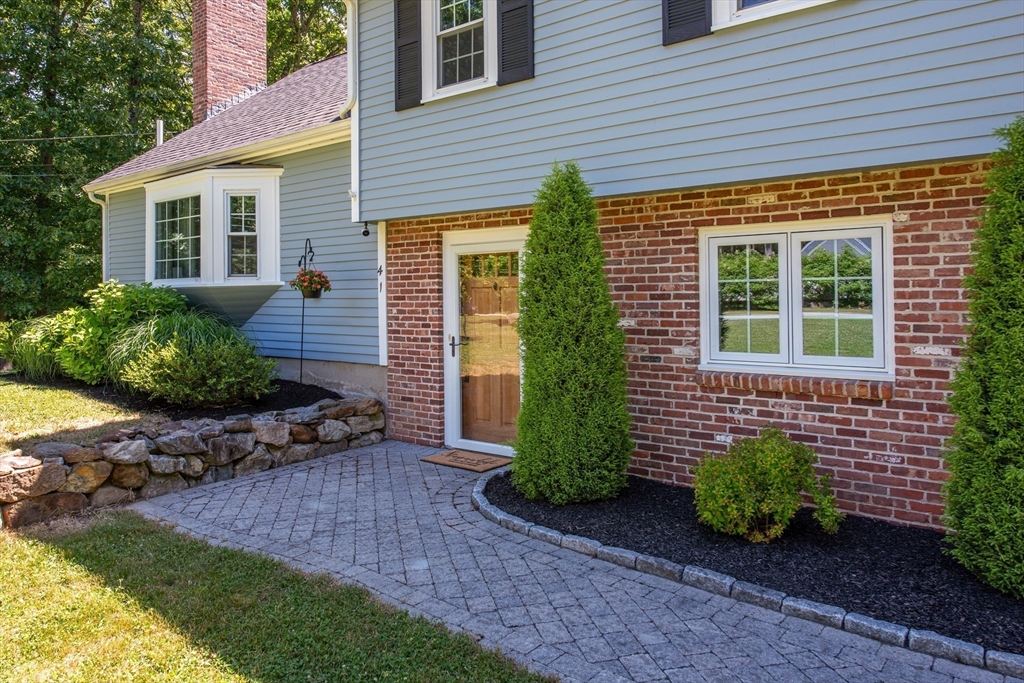 41 Woodcrest Road Boxford, MA 01921 - Photo 24 of 31 a front view of a house with garden