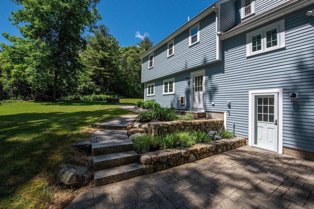 41 Woodcrest Road Boxford, MA 01921 - Photo 29 of 31 a front view of a house with a yard