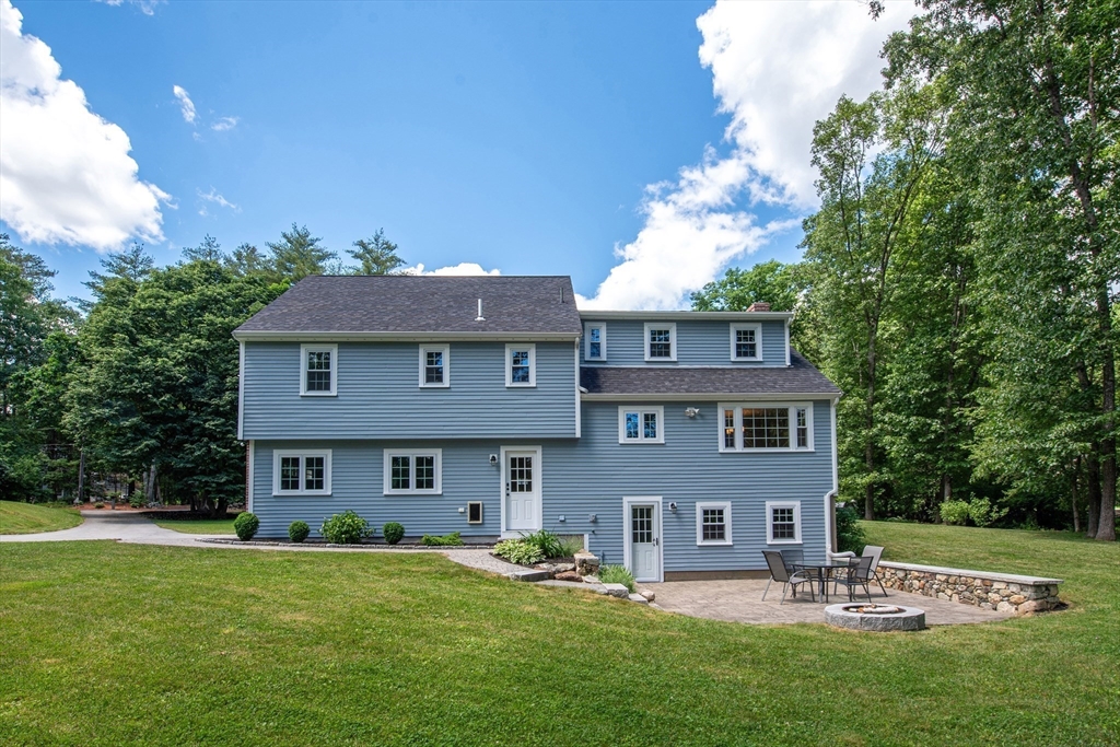 41 Woodcrest Road Boxford, MA 01921 - Photo 3 of 31 a front view of a house with garden