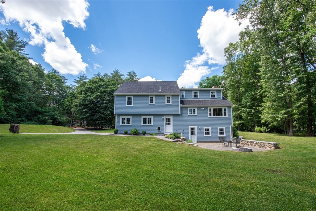 41 Woodcrest Road Boxford, MA 01921 - Photo 31 of 31 a house view with a sitting space and garden view