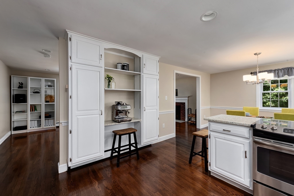 41 Woodcrest Road Boxford, MA 01921 - Photo 6 of 31 a kitchen with stainless steel appliances a stove top oven a sink and a refrigerator