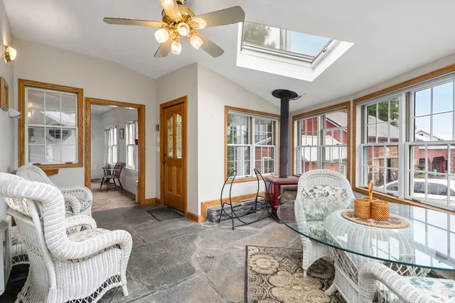 a very nice looking living room with a large window