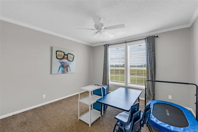 a workspace with furniture and a window