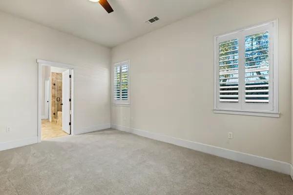 an empty room with windows