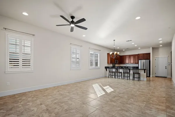 a view of a livingroom with furniture and windows