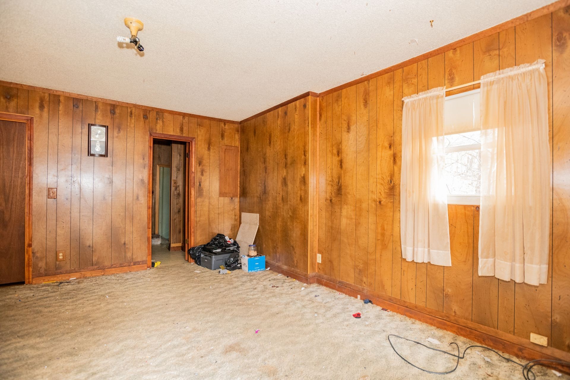 2434 Greenbriar Road Waverly, TN 37185 - Photo 5 of 21 a view of a room with window and a ceiling fan