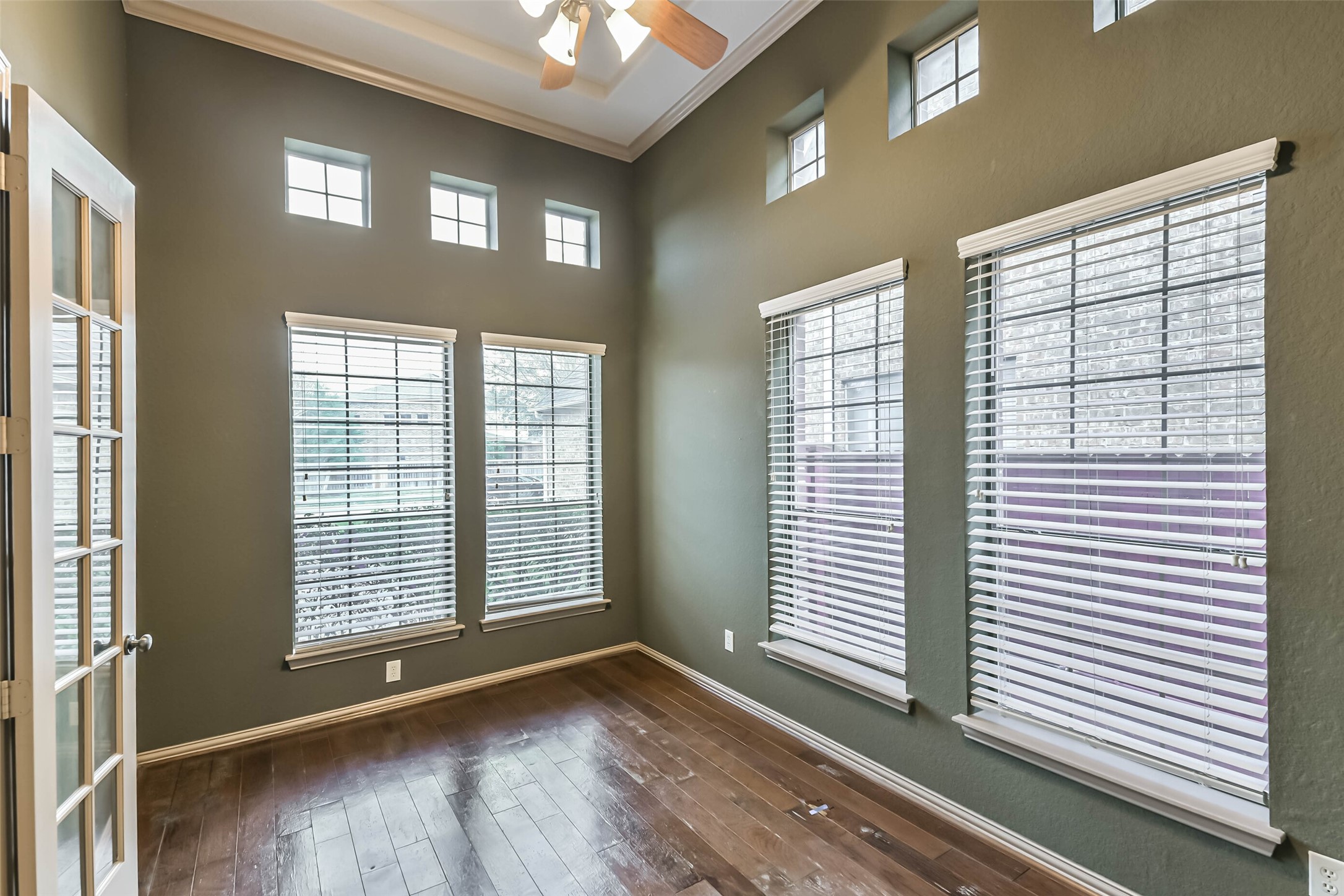 18743 Duke Lake Drive Spring, TX 77388 - Photo 15 of 42 a view of an empty room with wooden floor and a window