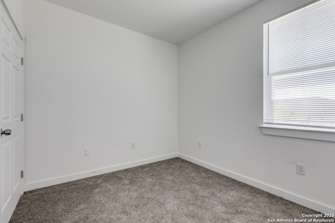 5415 Ingram Road, Unit 1203 San Antonio, TX 78228 - Photo 11 of 12 a room that has a window in it