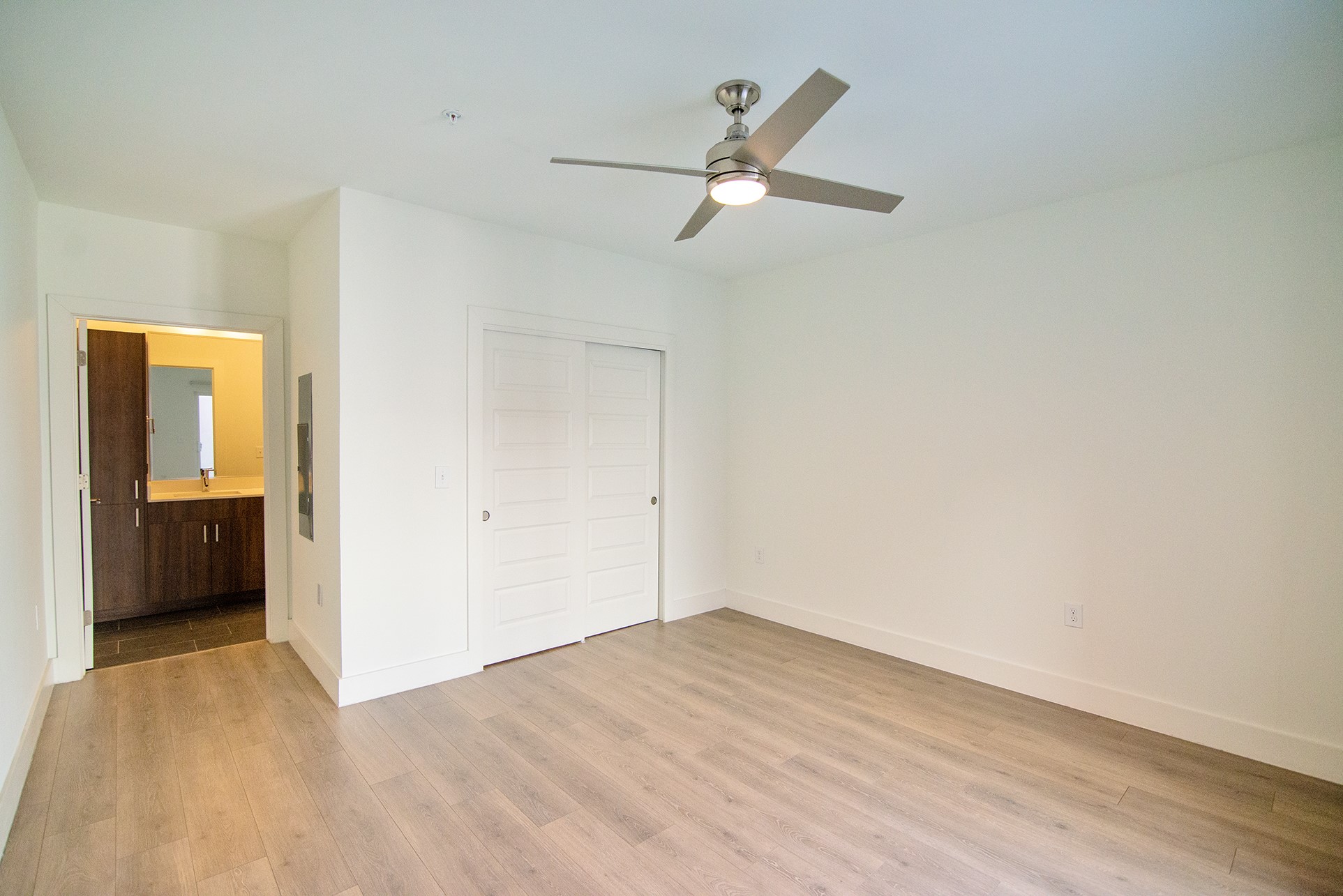 2213 Poquito Street, Unit 313 Austin, TX 78722 - Photo 16 of 26 a view of empty room with wooden floor