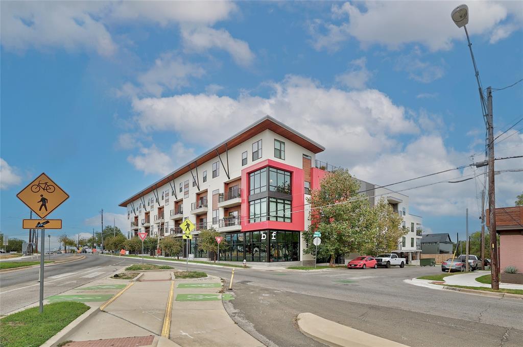 2213 Poquito Street, Unit 313 Austin, TX 78722 - Photo 25 of 26 a view of a building with traffic signal lights