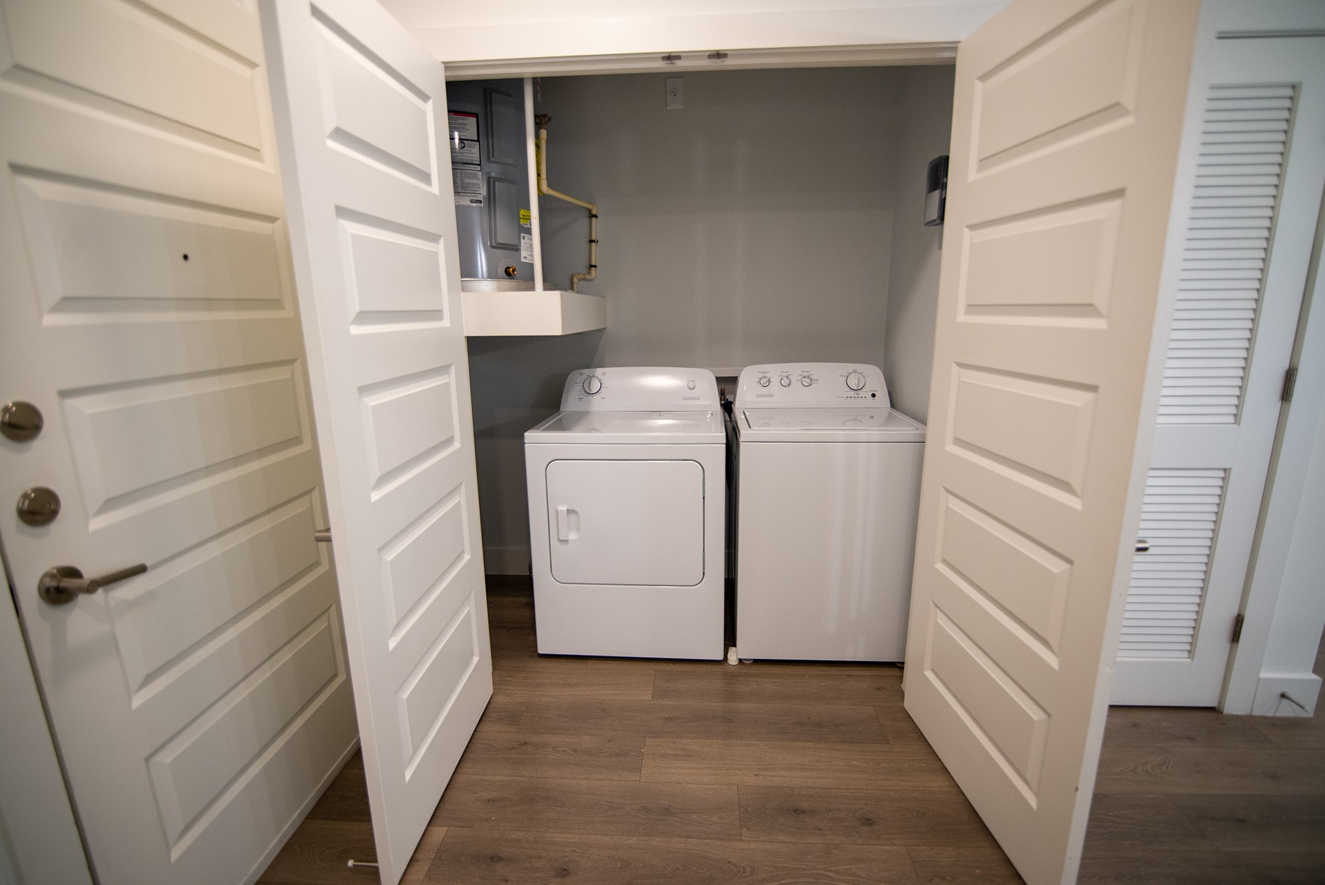 2213 Poquito Street, Unit 313 Austin, TX 78722 - Photo 7 of 26 a utility room with dryer and washer