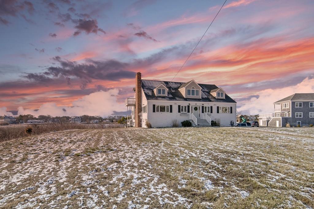 62 Surfside Road Scituate, MA 02066 - Photo 19 of 19 a large building with a big yard