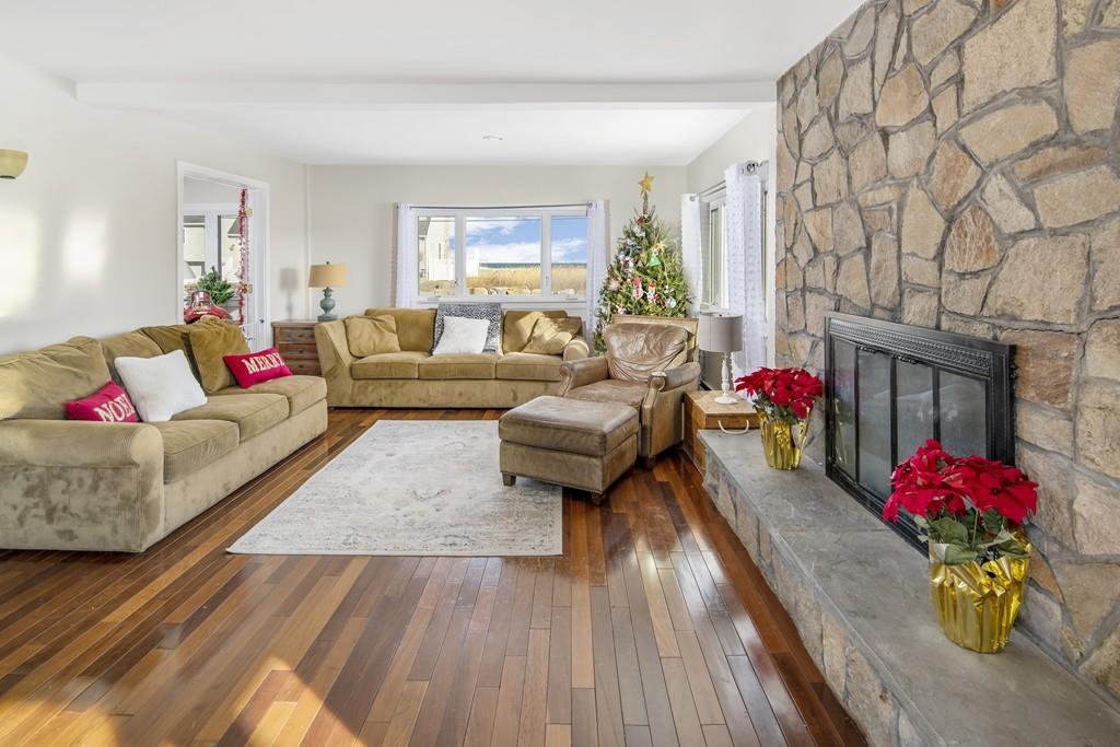 62 Surfside Road Scituate, MA 02066 - Photo 10 of 19 a living room with furniture and a couch