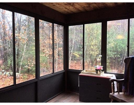 130 Tuckerman Road Ashburnham, MA 01430 - Photo 20 of 30 a room view with a large window and dining table