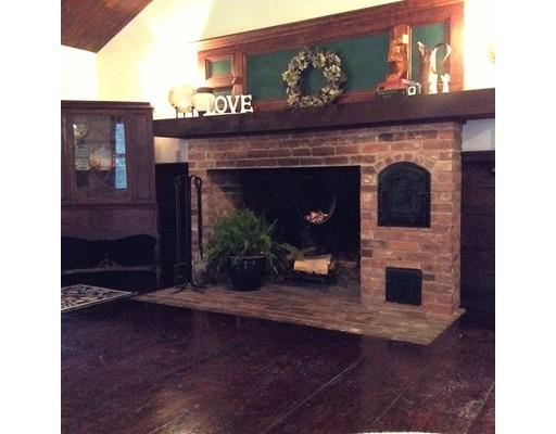 130 Tuckerman Road Ashburnham, MA 01430 - Photo 8 of 30 a living room with furniture and a fireplace