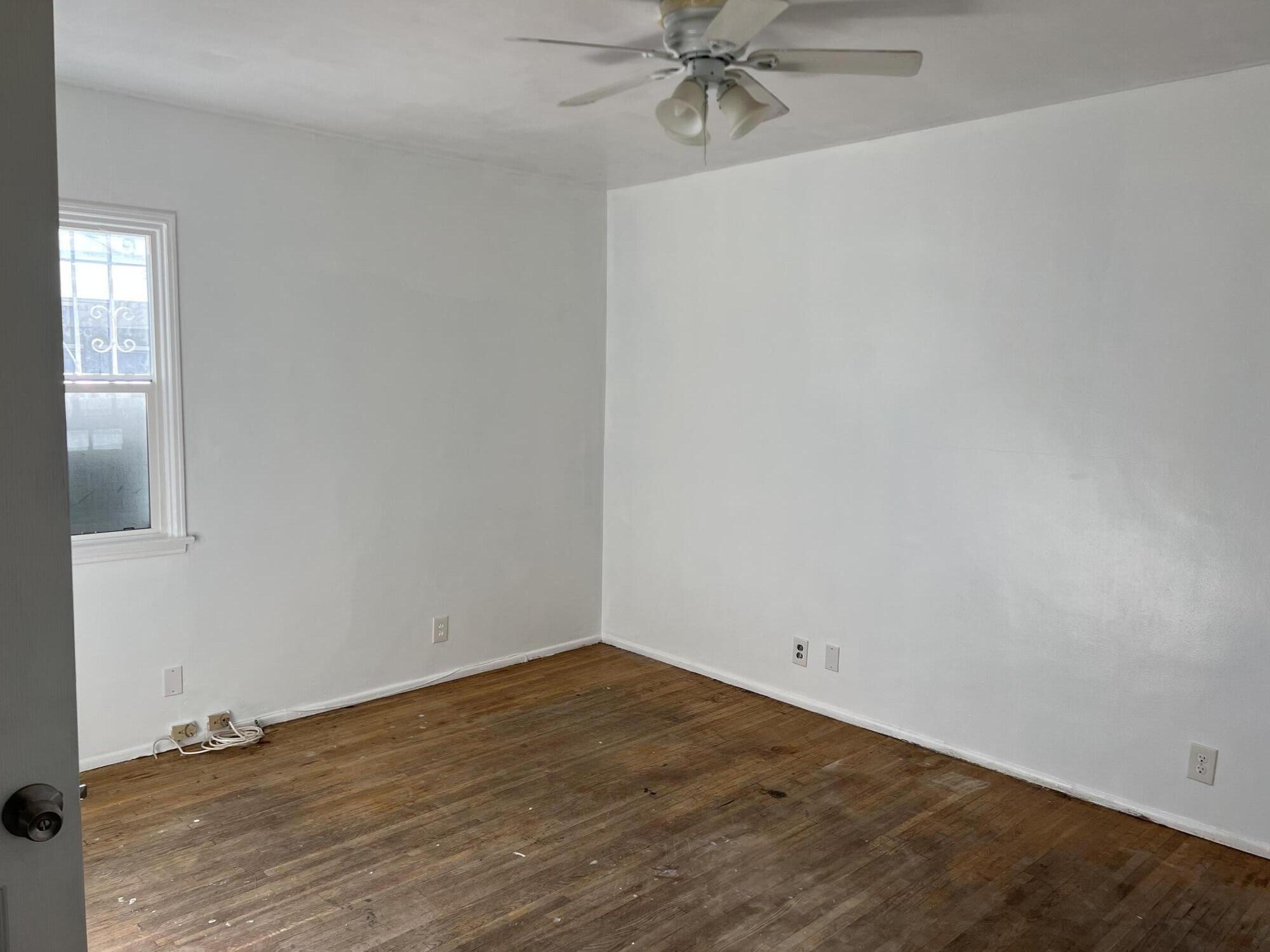 4916 Brompton Avenue Bell, CA 90201 - Photo 32 of 50 wooden floor in an empty room