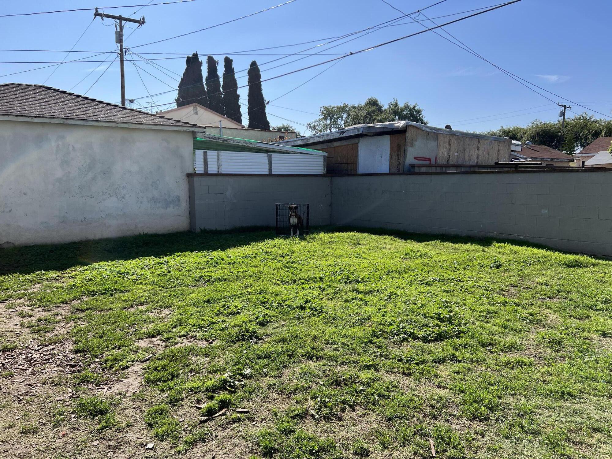 4916 Brompton Avenue Bell, CA 90201 - Photo 38 of 50 a view of a house with a yard